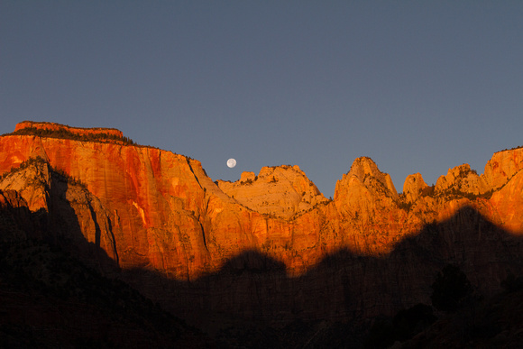 Sunrise with moon setting between the West Temple and the Towers of the Virgin - Zion National Park,